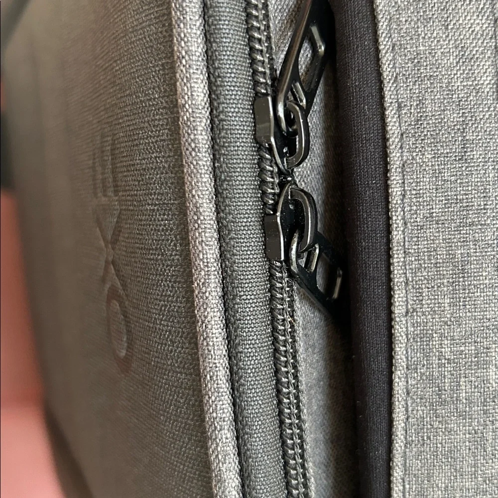 EXO Padded Men's Black Crossbody Bag. Protection for what you carry. 11x8.5”.